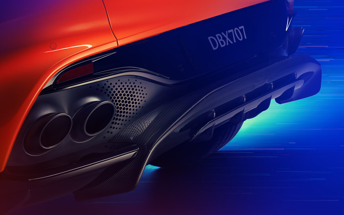 Close-up of the DBX707 quad exhaust tips and rear diffuser