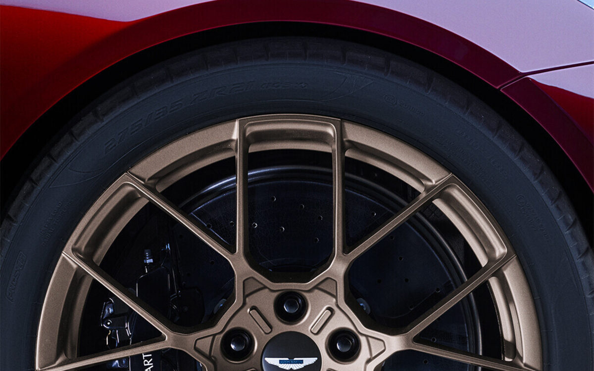 Close-up of the bronze alloy wheel and brake caliper on the Vanquish