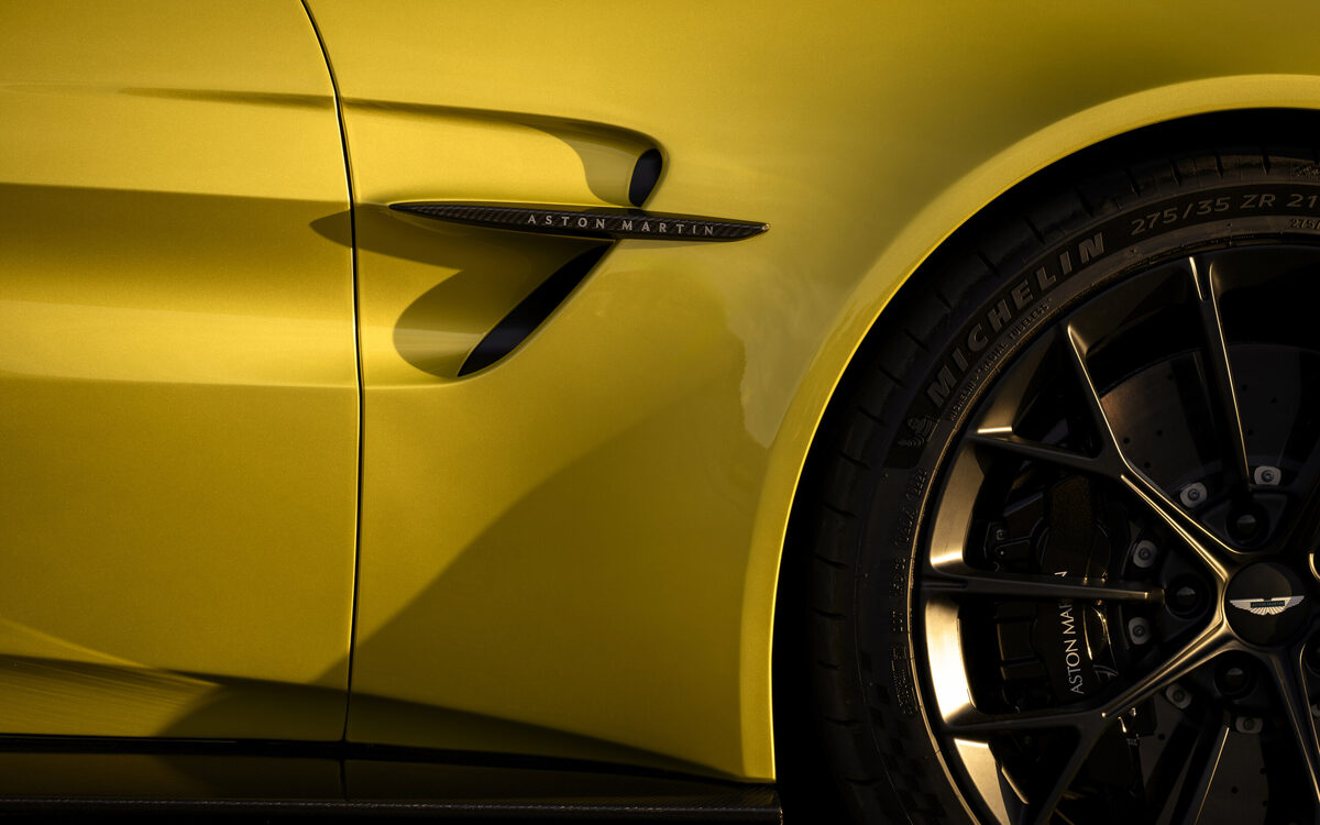 Close-up of the Vantage side vent with Aston Martin lettering and Michelin tyre
