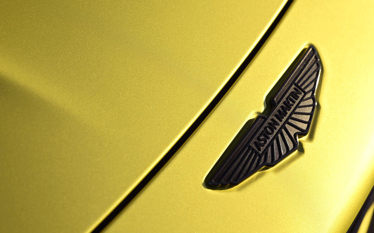 Close-up of the Aston Martin winged badge on the Vantage bonnet