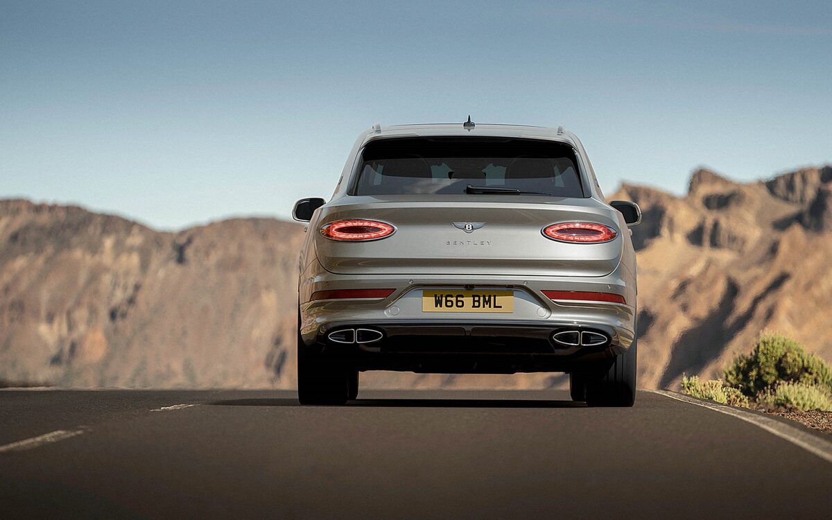 Bentley Bentayga seen from directly behind showing the tail lamps and twin exhausts