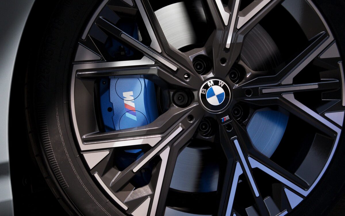 Close-up of the BMW 2 Series Gran Coupe alloy wheel with blue M brake caliper