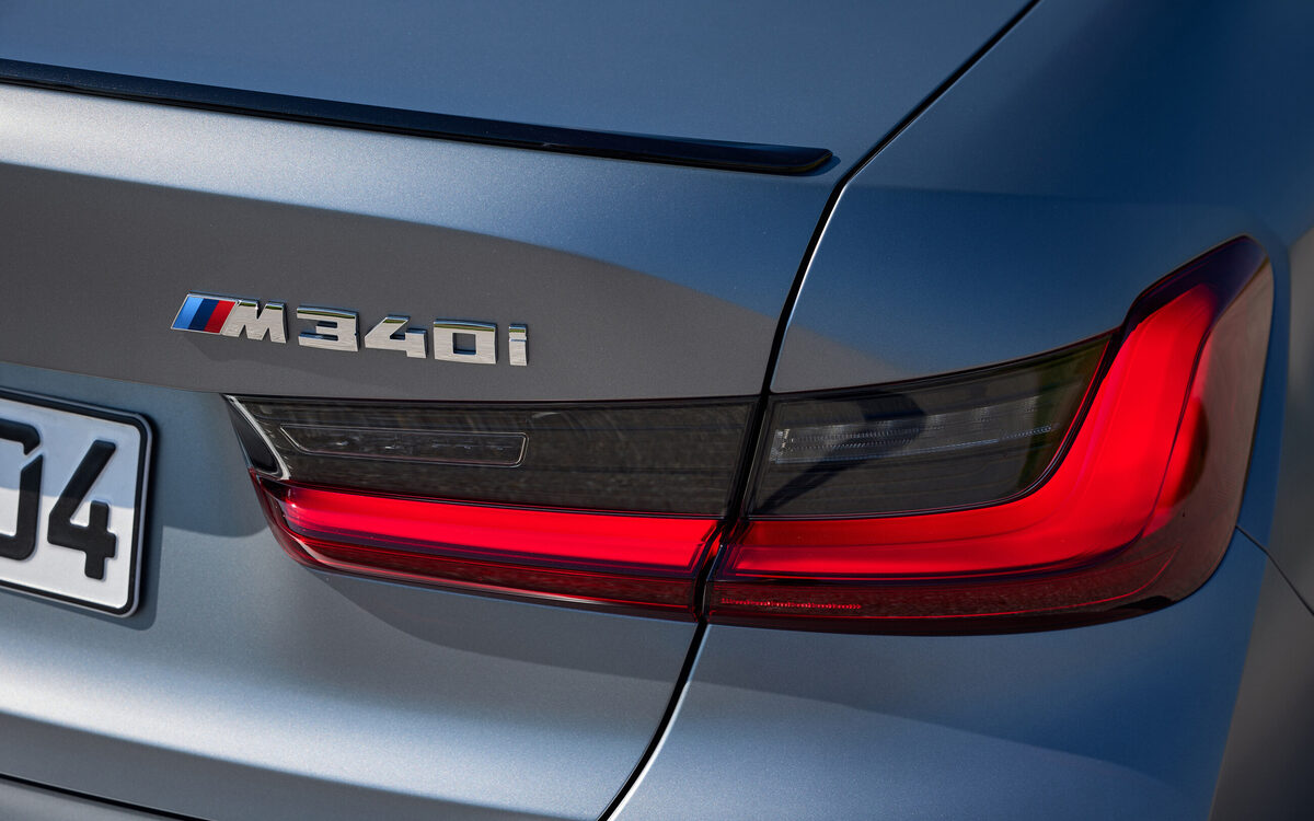 Close-up of the M340i LED tail lamp and M340i badge