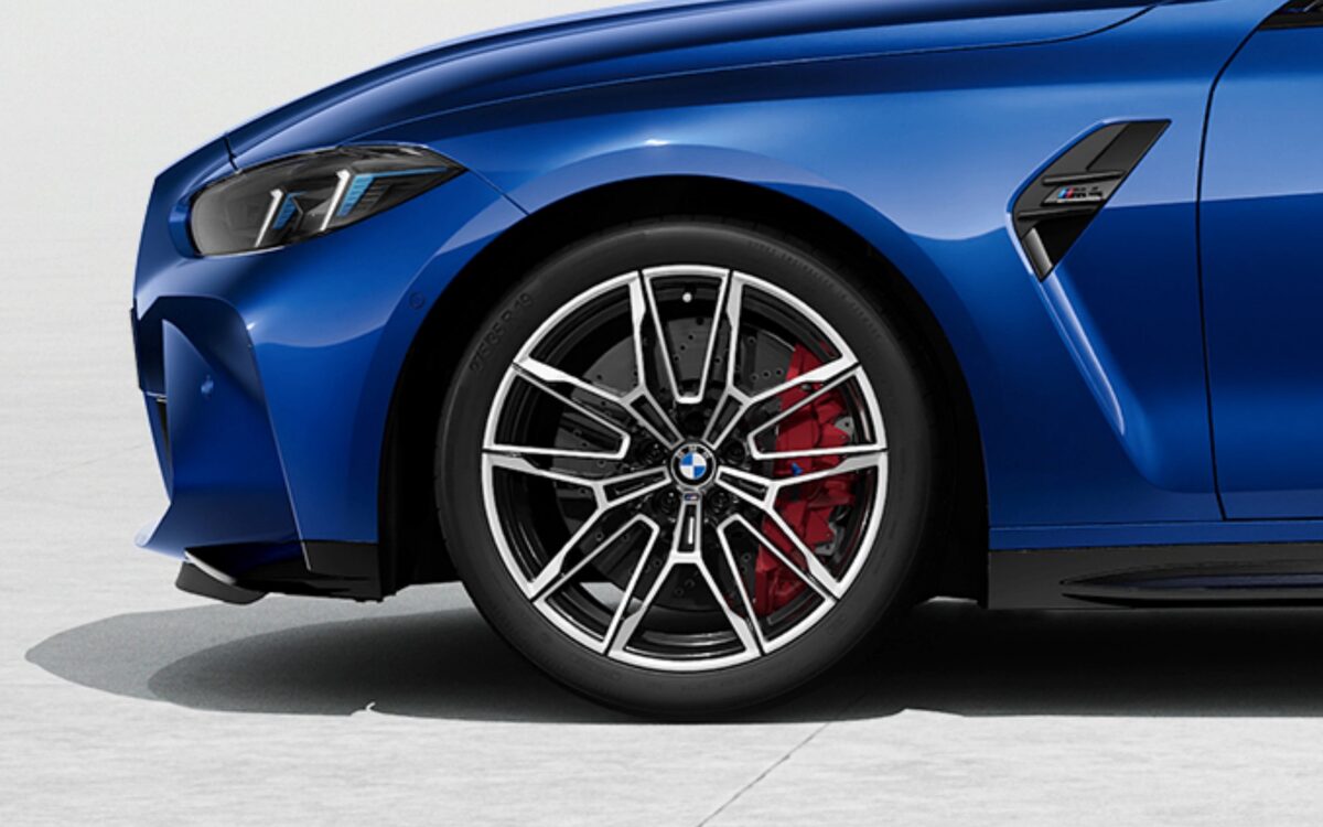 Close-up of the M4 Competition alloy wheel with red M brake caliper