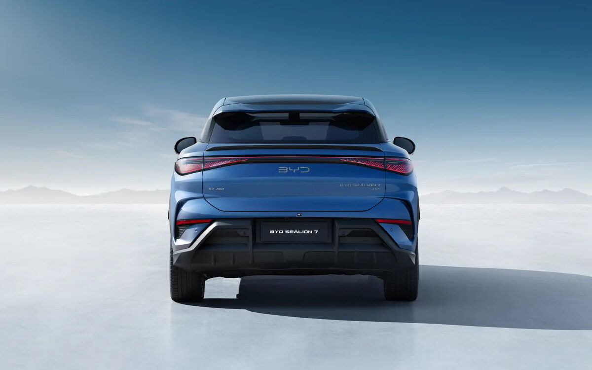 BYD Sealion 7 in blue seen from directly behind with the full-width LED tail lamp strip