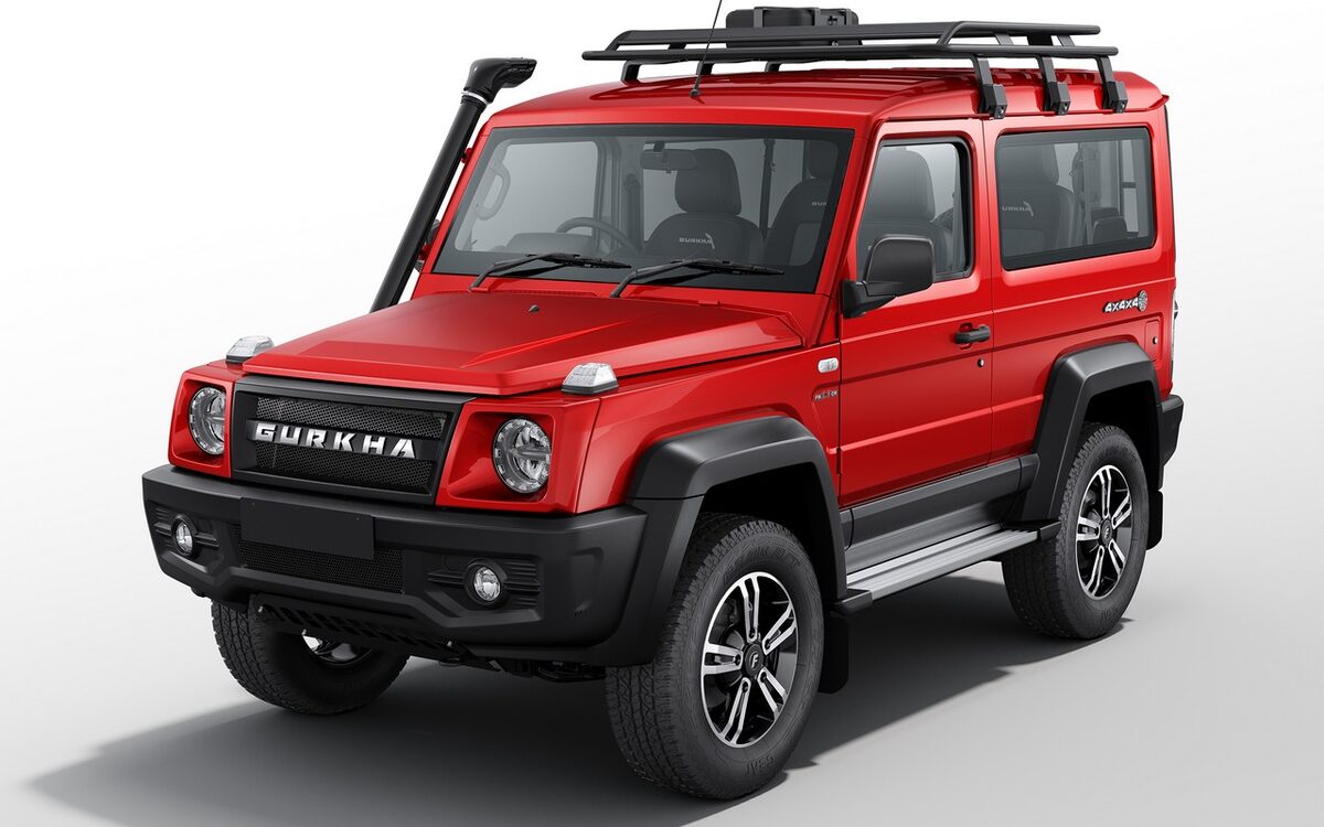 Force Gurkha 3-door in red, front three-quarter view from the other side