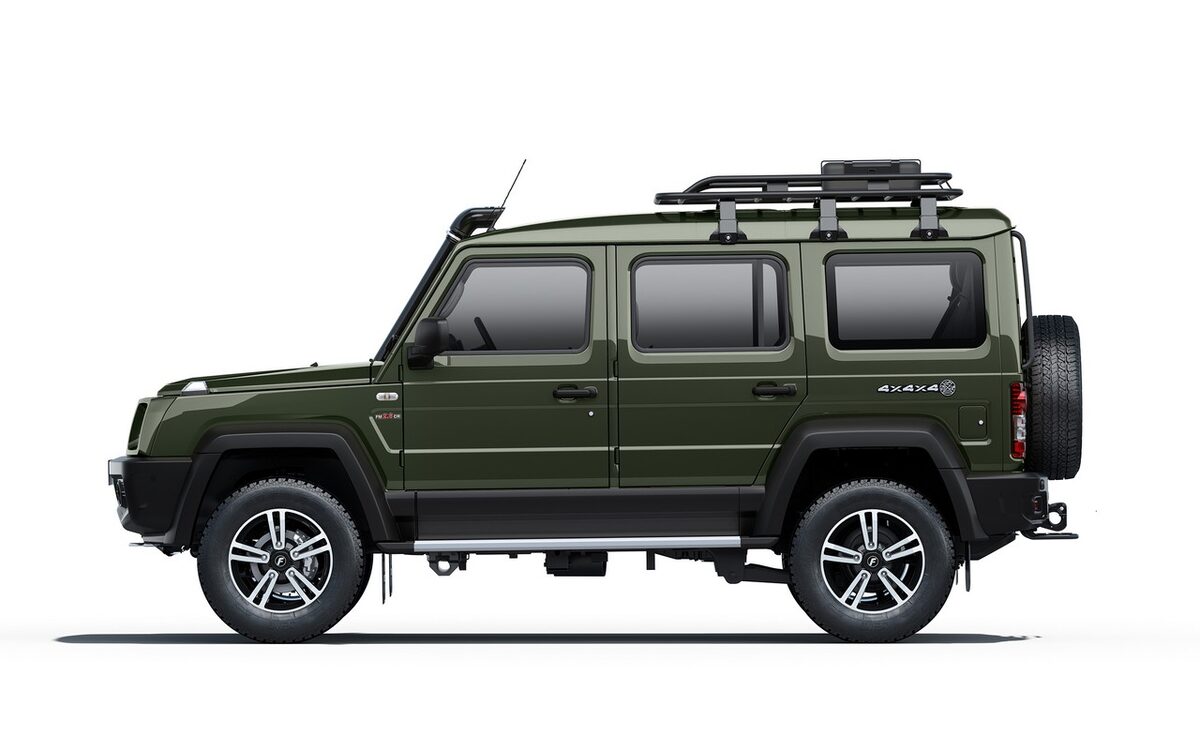 Force Gurkha 5-door in green, side profile on a white studio background