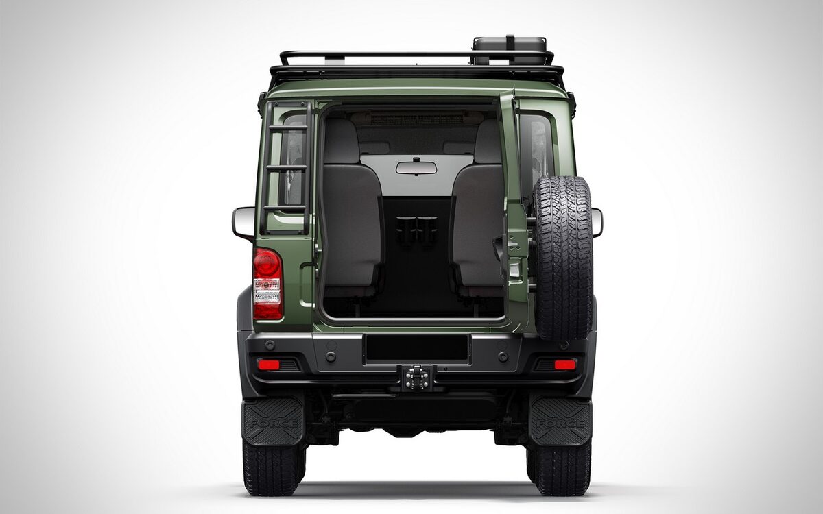 Force Gurkha 5-door in green seen from behind with the tailgate open