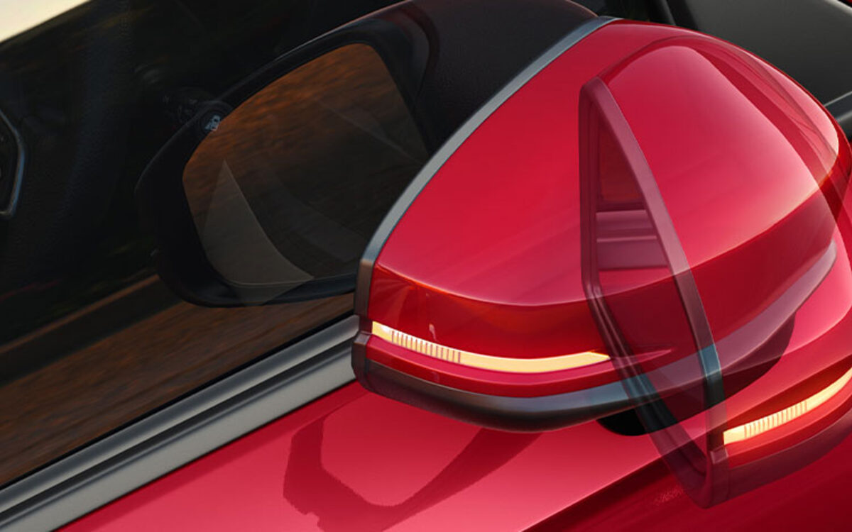 Close-up of the Honda Amaze door mirror with integrated turn indicator
