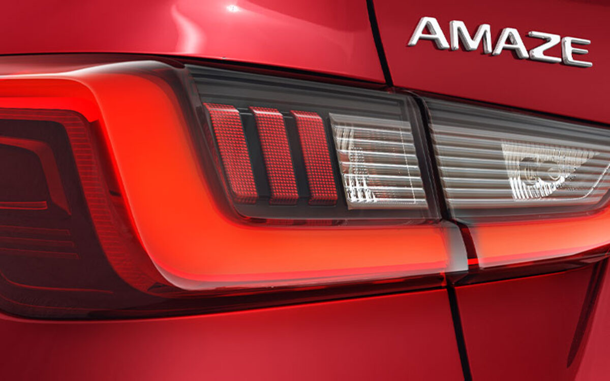 Close-up of the Honda Amaze LED tail lamp with Amaze badge