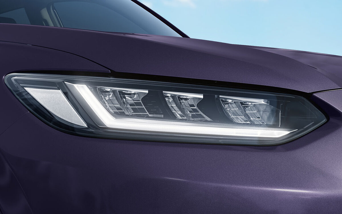 Close-up of the ZR-V triple-element LED headlamp with signature daytime running light