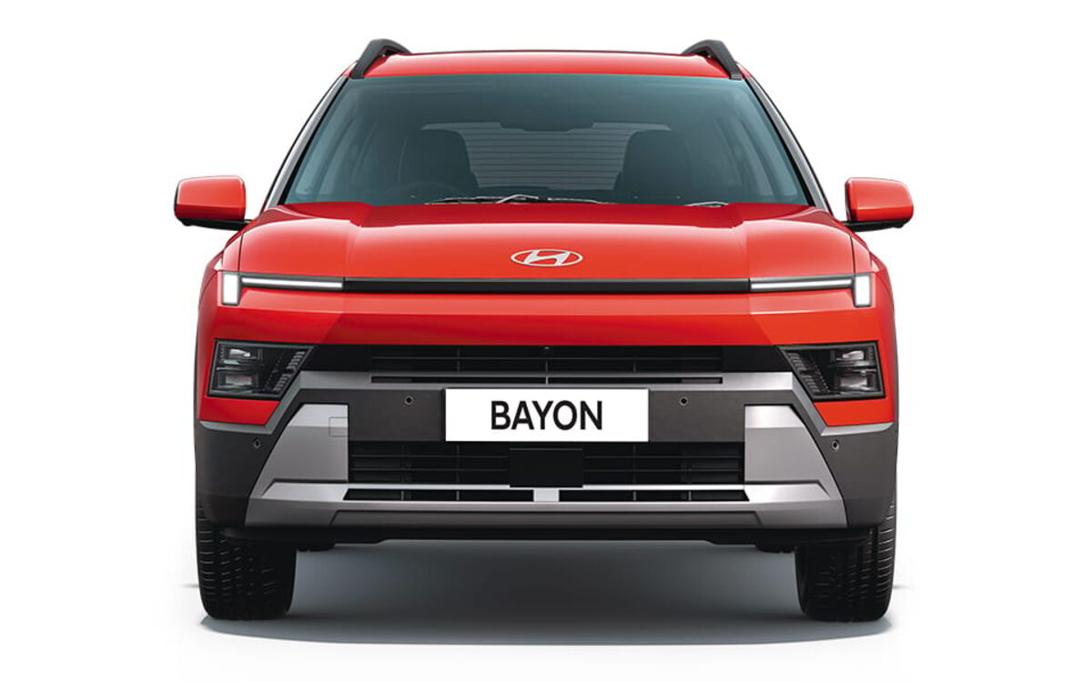 Hyundai Bayon in Fiery Red, straight front view on a white background