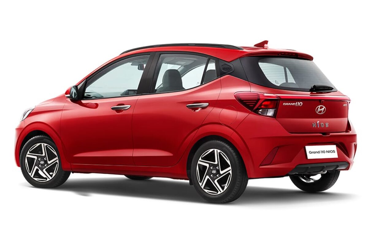 Hyundai Grand i10 Nios in red, rear three-quarter view on a white background