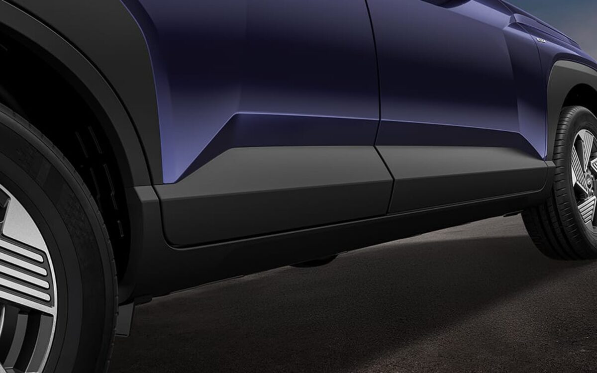 Close-up of the Venue's side body panel and black lower cladding
