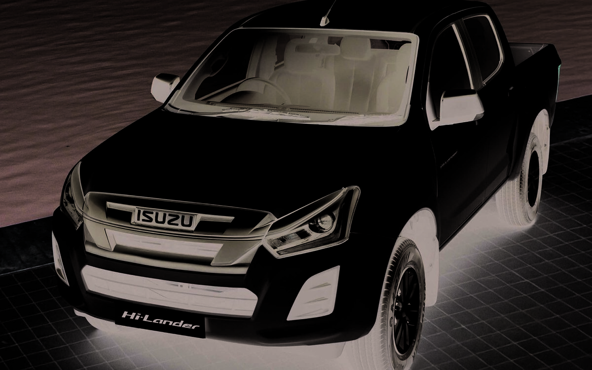 White Isuzu Hi-Lander seen from above in front three-quarter view beside a lake (cropped from the brochure page)