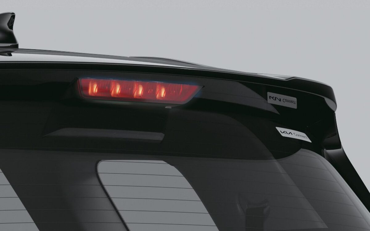 Kia Carens rear roof spoiler with shark-fin antenna and stop lamp
