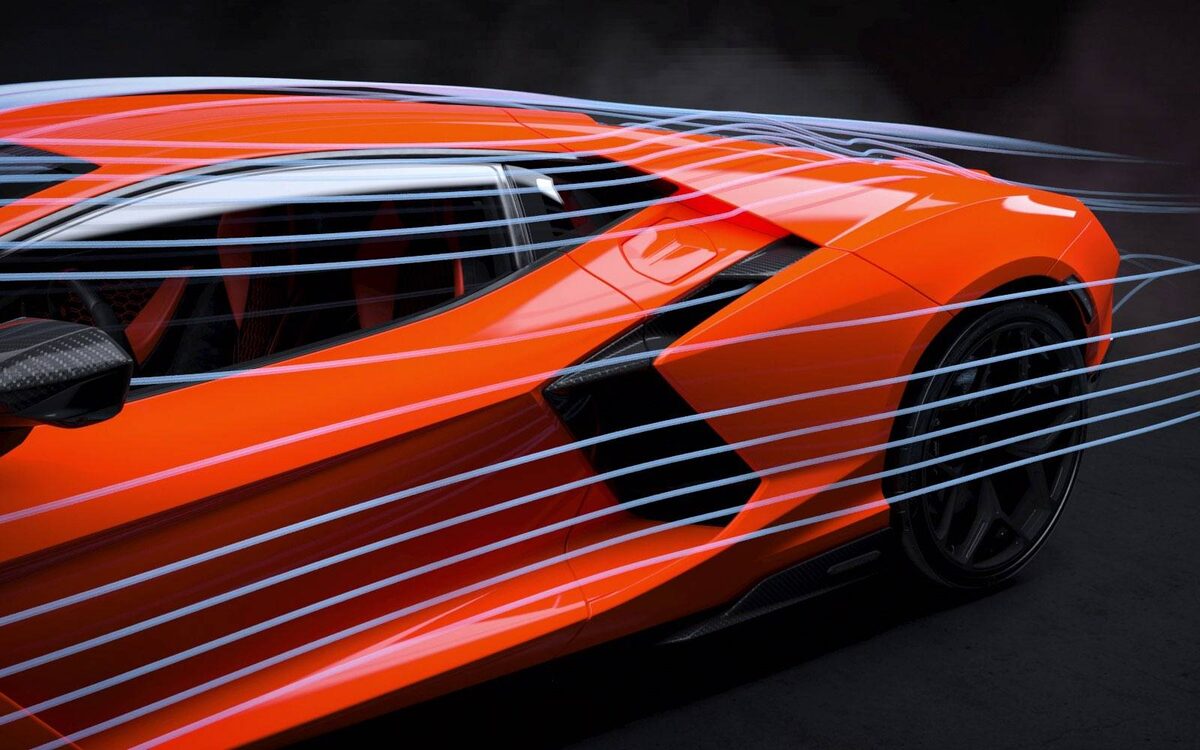 Lamborghini Revuelto side close-up in orange showing the door air intake and airflow lines