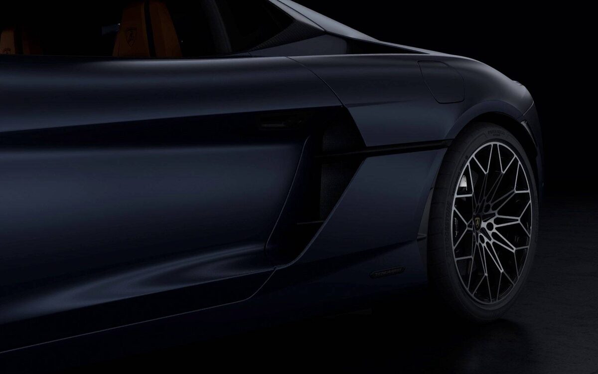 Lamborghini Temerario side close-up of a dark car showing the door air intake and wheel