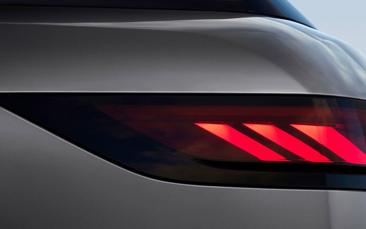 Close-up of the Range Rover Sport red LED tail lamp with three-bar signature