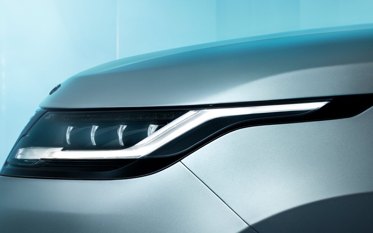 Close-up of the Range Rover Velar slim LED headlamp and DRL signature