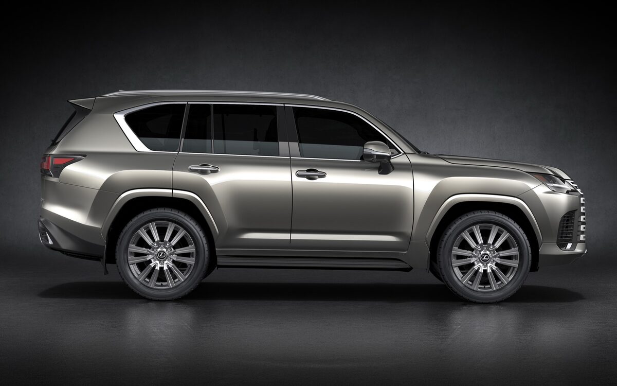 Side profile of the Lexus LX in a dark studio