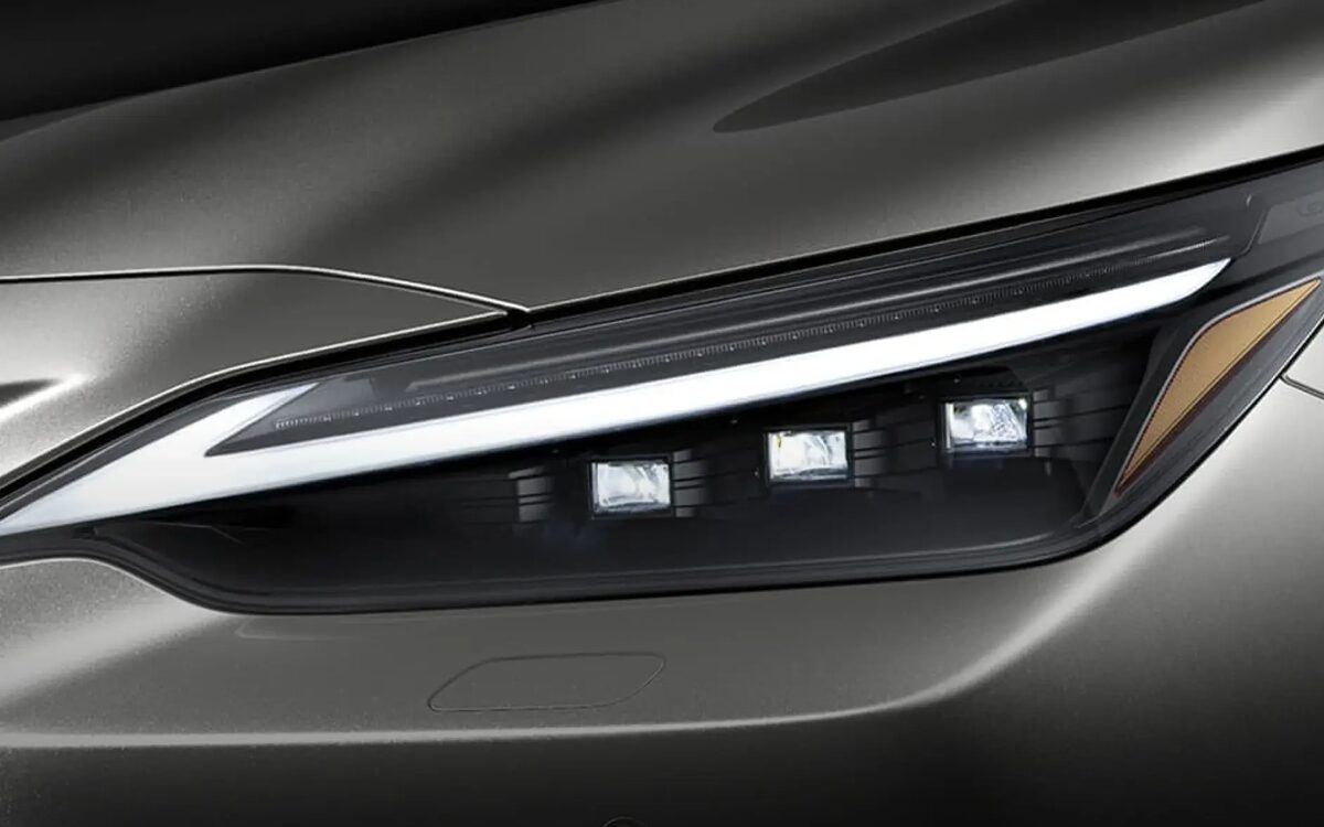 Close-up of the Lexus NX triple-projector LED headlamp with L-shaped daytime running light