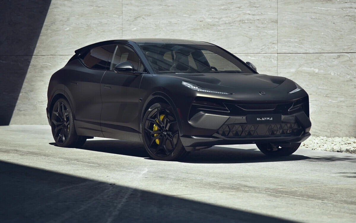 Lotus Eletre in dark finish with yellow brake calipers, front three-quarter view