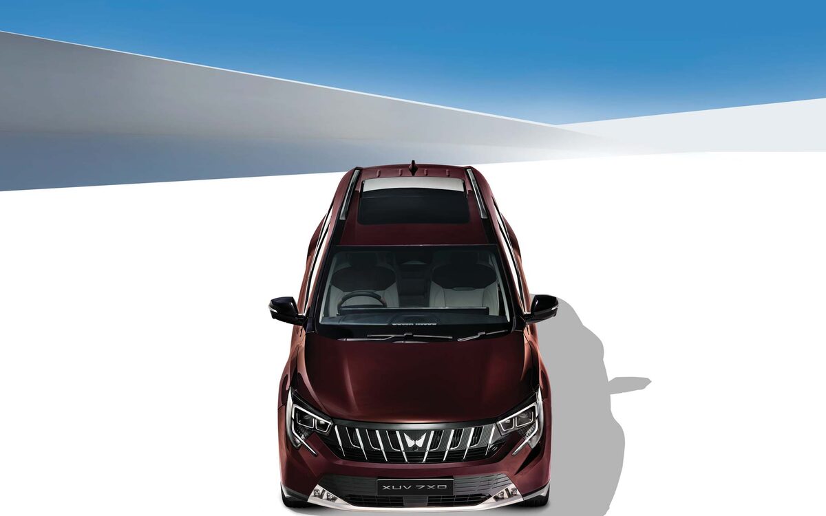 XUV 7XO in dark red seen from above and the front