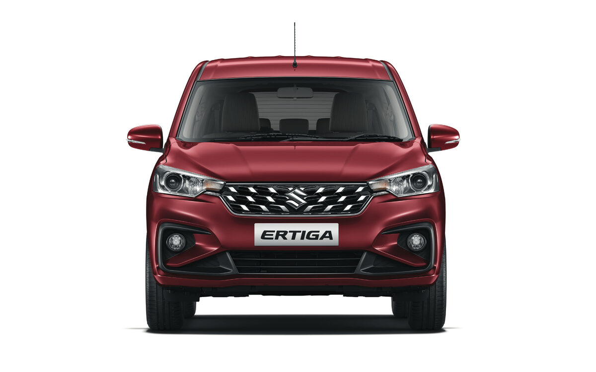Maruti Suzuki Ertiga in Auburn Red, straight front view on a white background
