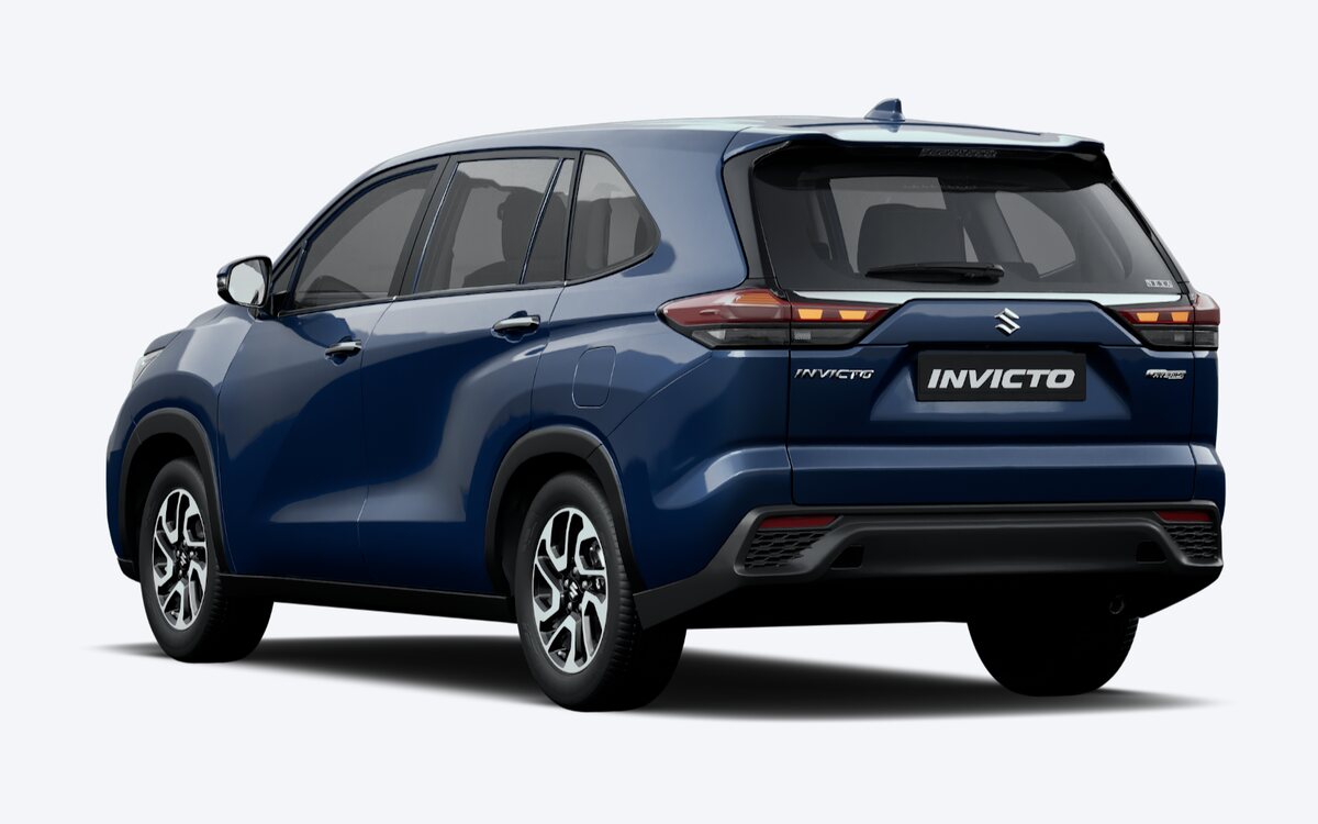 Maruti Suzuki Invicto in Nexa Blue Celestial, rear three-quarter view with the tail lamps and tailgate on a transparent background