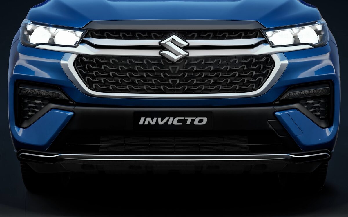 Close-up of the Invicto's LED headlamp and the upper grille in blue