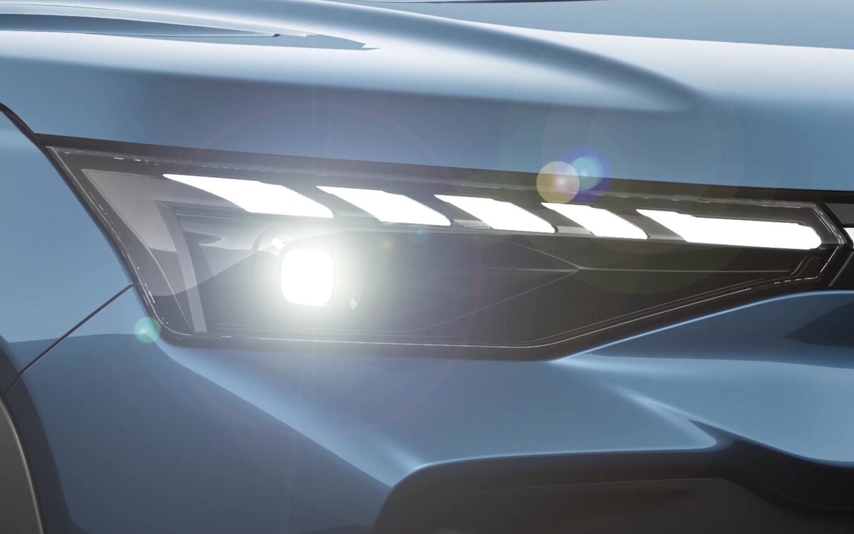 Close-up of the Victoris's bold-cut LED daytime running lights and headlamp on a blue body