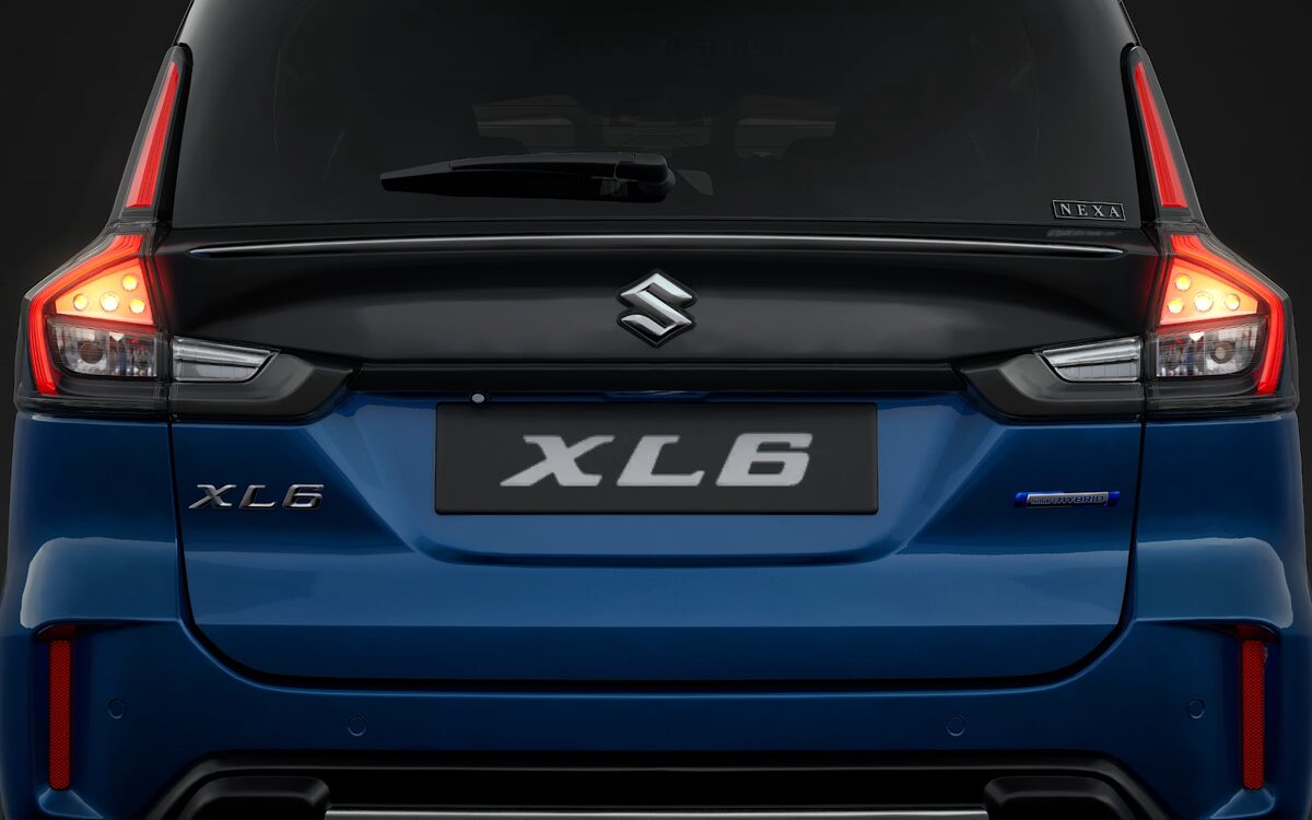 Rear view of the blue XL6 showing the tail lamps, tailgate and XL6 badge