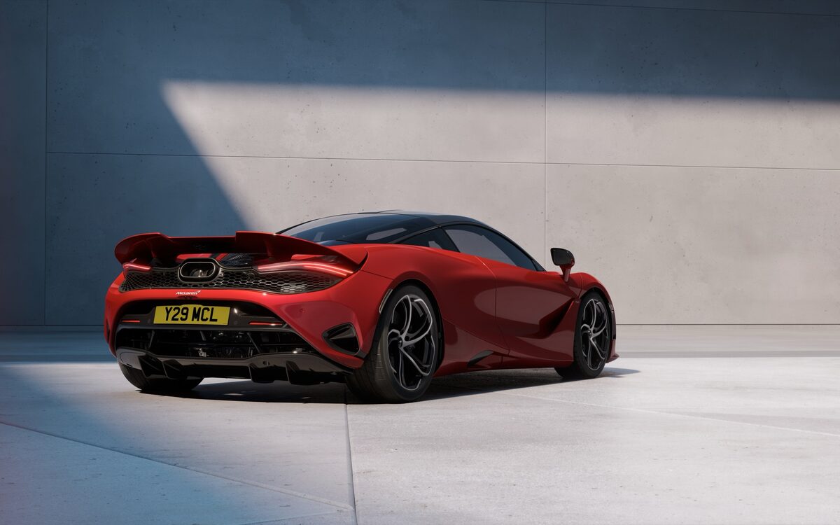 McLaren 750S in red, rear three-quarter view with the fixed rear wing