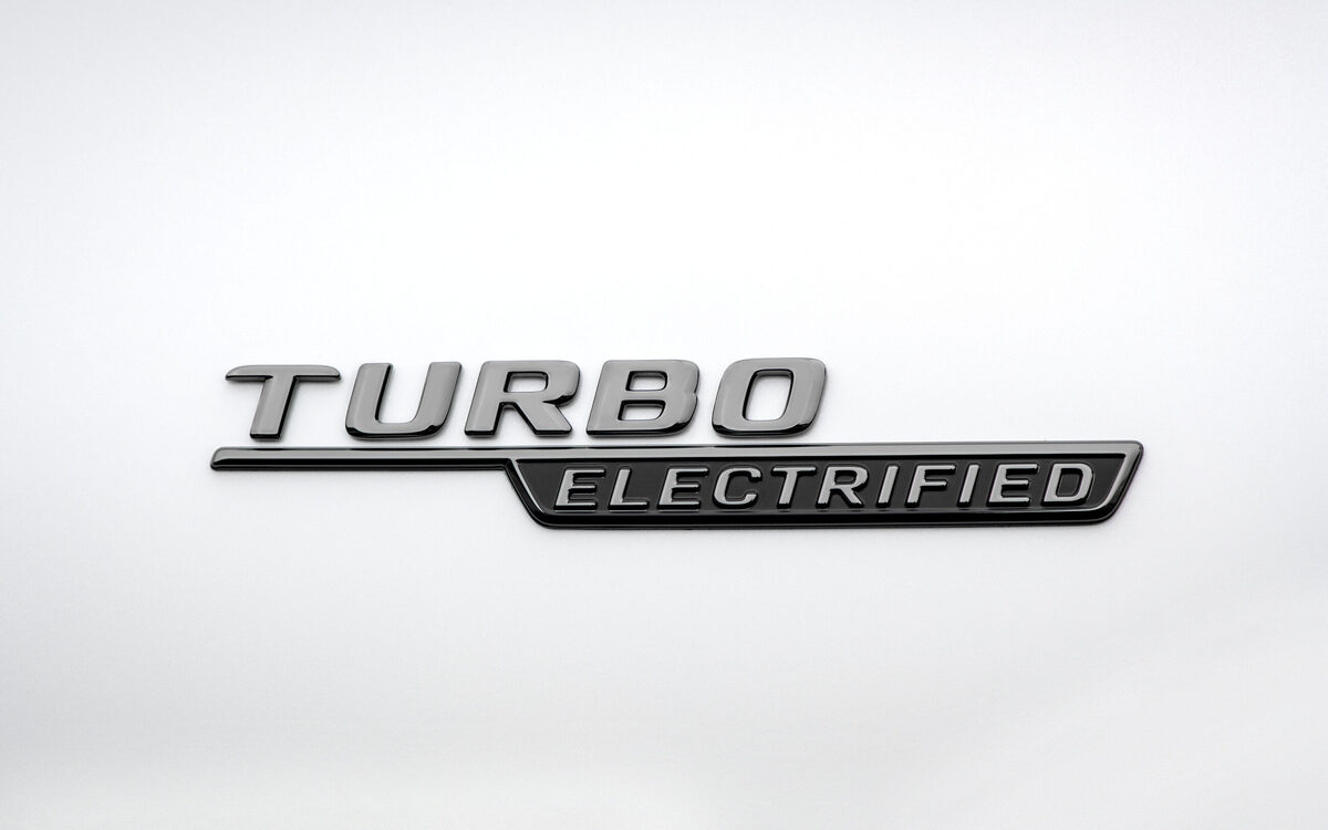 Turbo Electrified badge on the white bodywork of the Mercedes-AMG C 43
