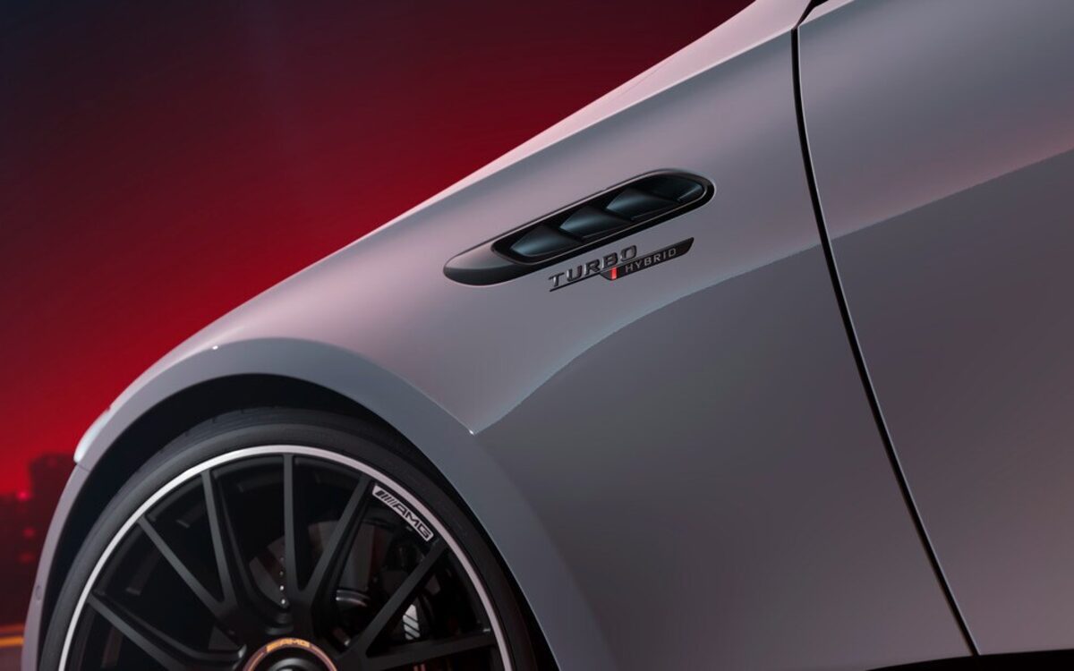 Close-up of the front fender vent with Turbo S E Performance badge and an AMG forged wheel