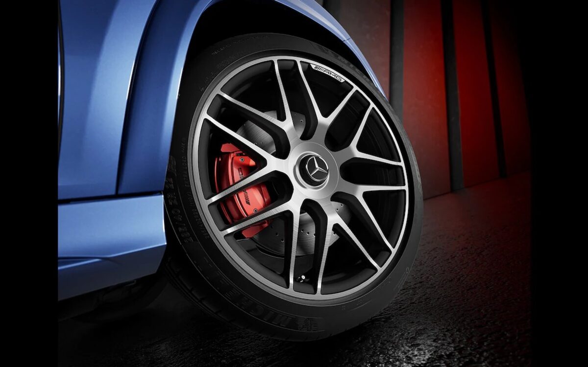 Close-up of an AMG multi-spoke alloy wheel with red brake caliper