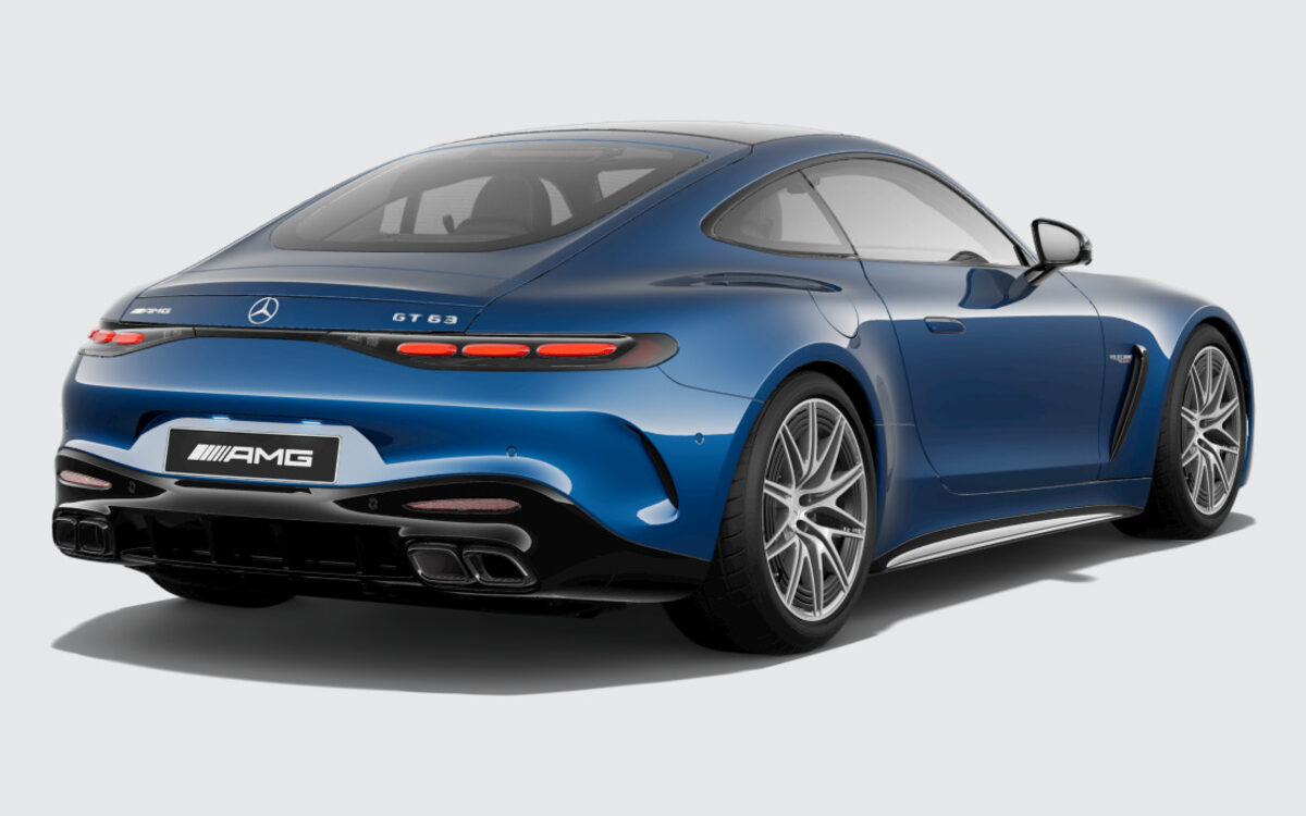 Mercedes-AMG GT Coupe in Spectral Blue, rear three-quarter view with quad exhausts