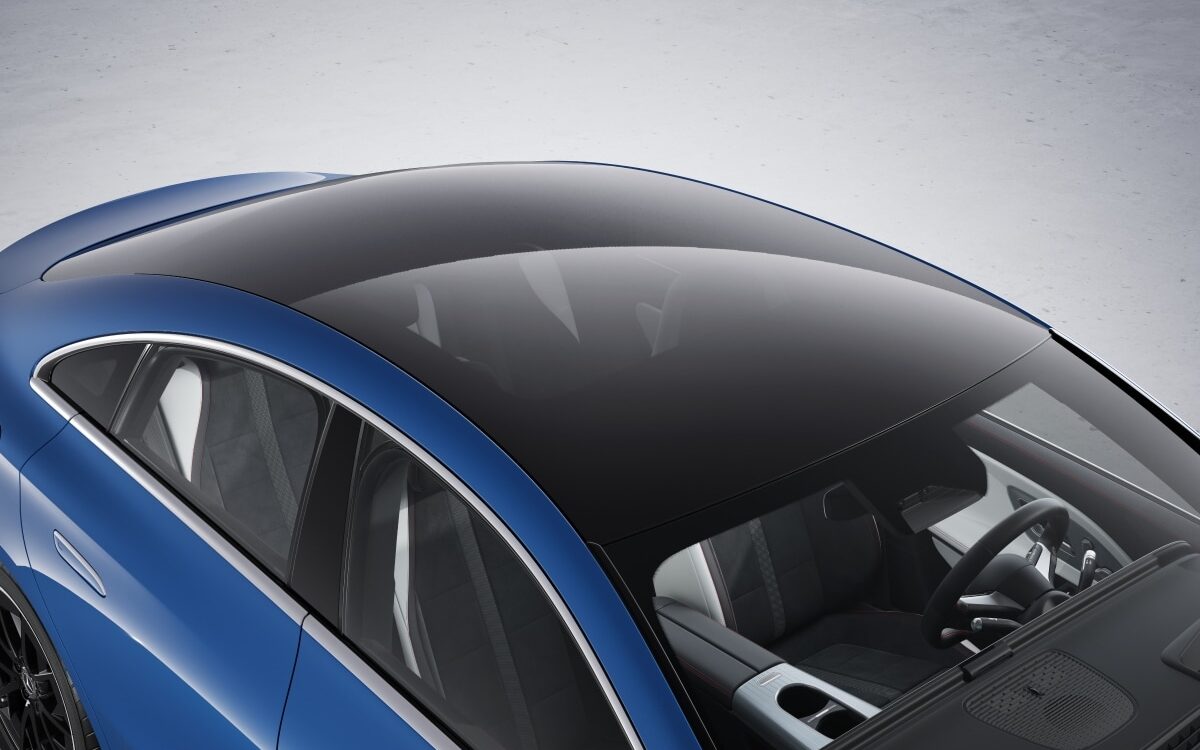 Blue Mercedes-Benz CLA seen from above showing the panoramic glass roof