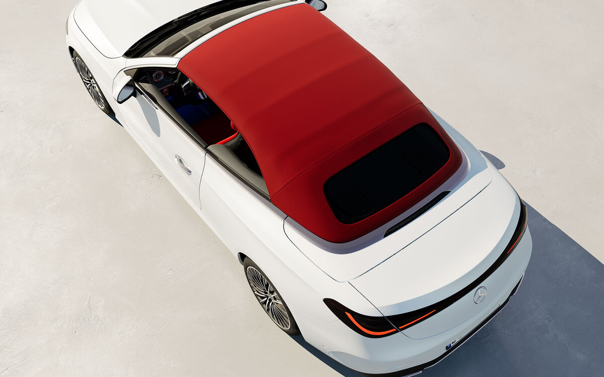 CLE Cabriolet in white with a red acoustic soft top, seen from above