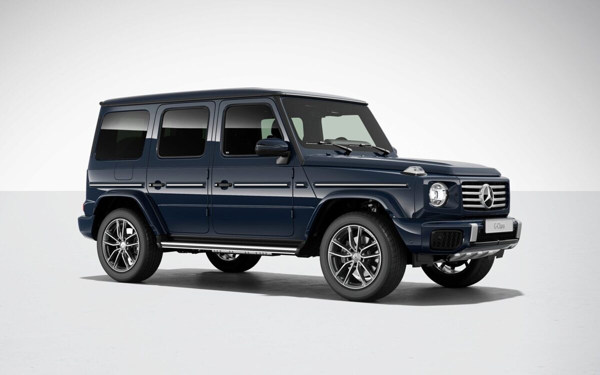 Mercedes-Benz G-Class in MANUFAKTUR dark blue, front three-quarter view on a light studio background