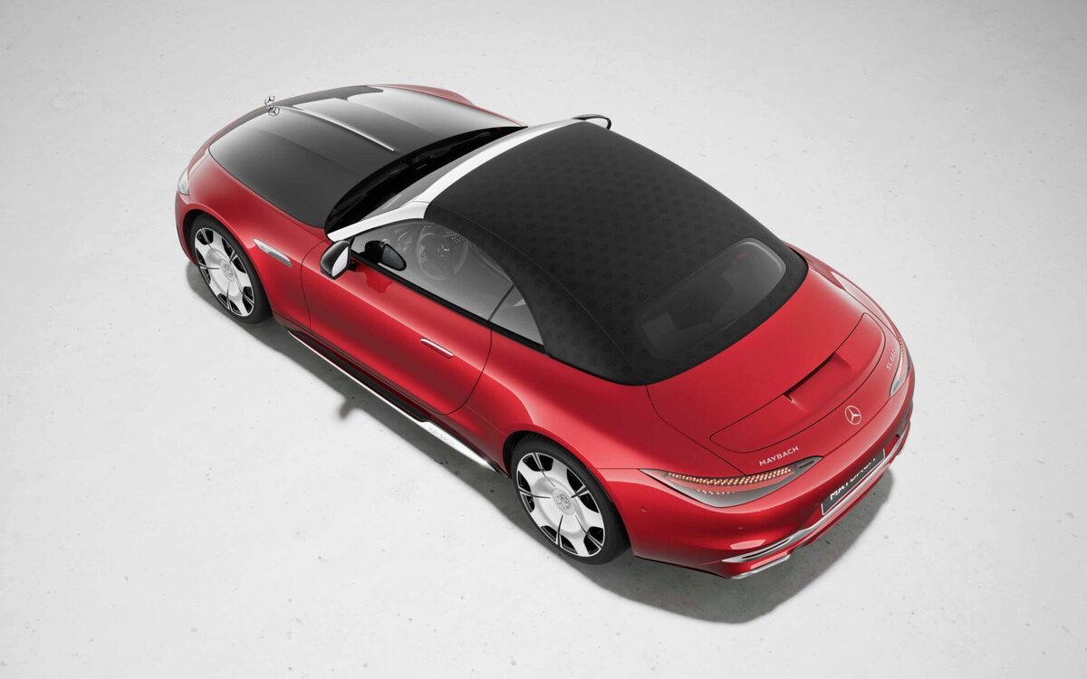 Red Mercedes-Maybach SL with the monogram soft top closed, seen from above on a light studio floor