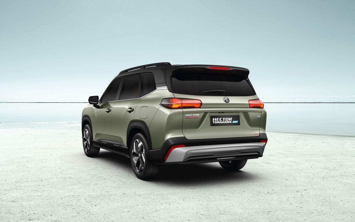 MG Hector Tomahawk EV in khaki green, rear three-quarter view showing the tail lamps