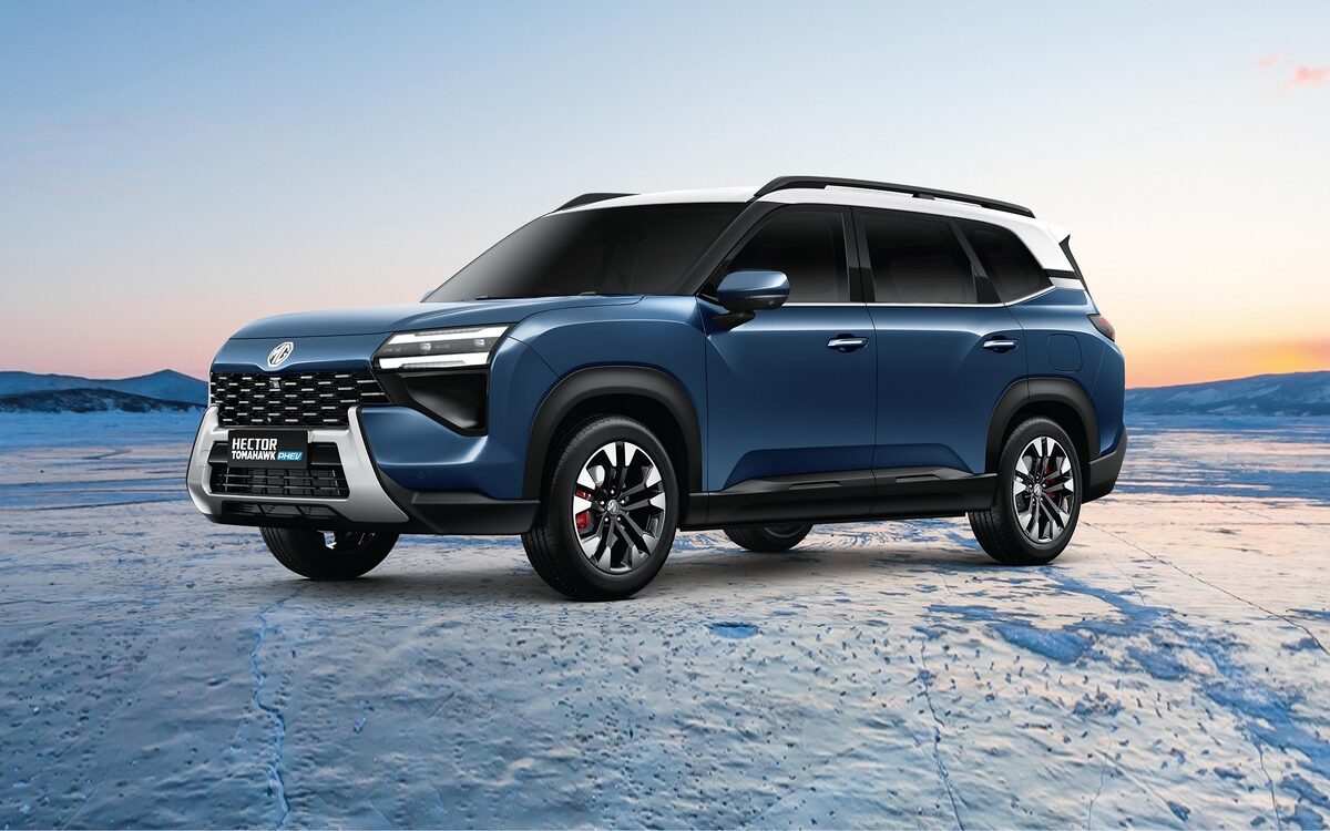 MG Hector Tomahawk PHEV in Celadon Blue with white roof, front three-quarter view on ice at sunset