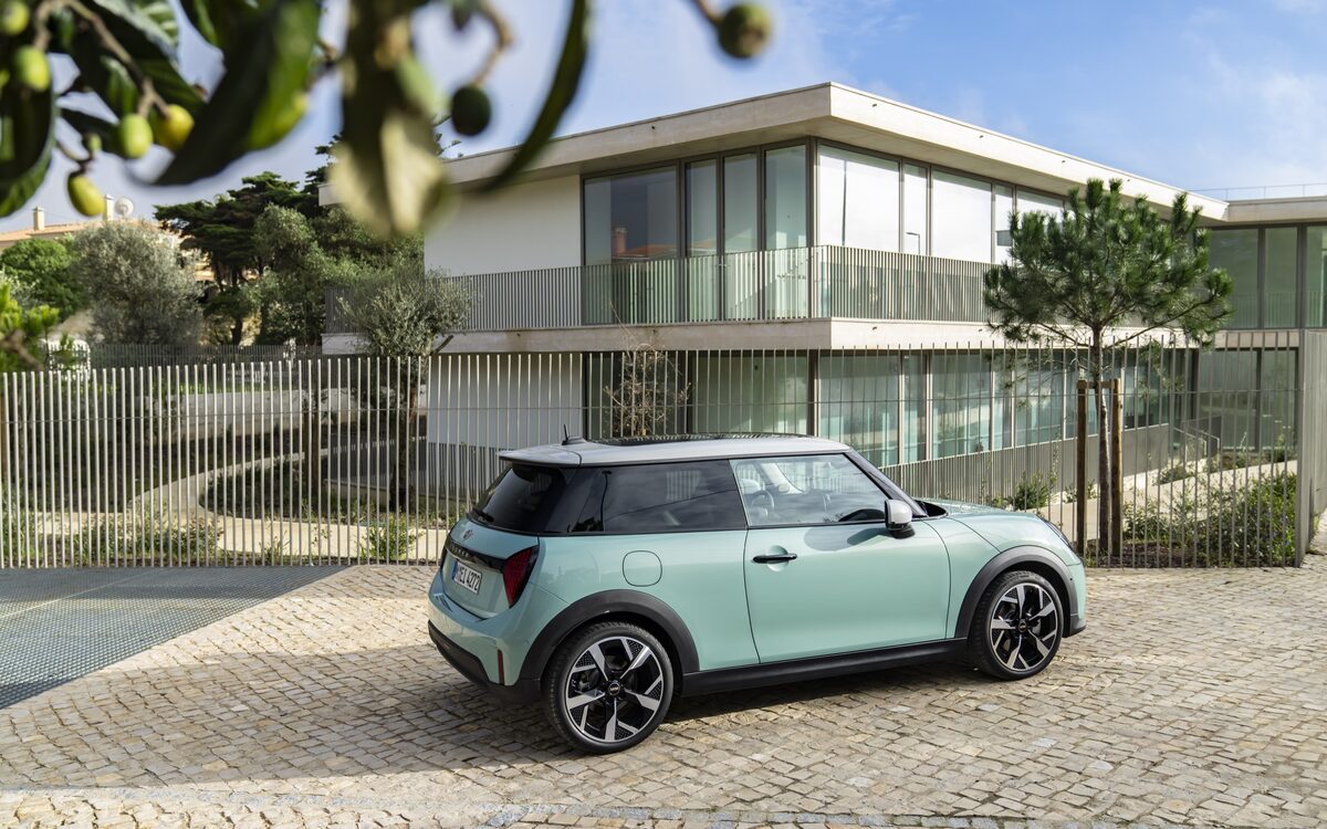 MINI Cooper S three-door in light green, rear three-quarter view