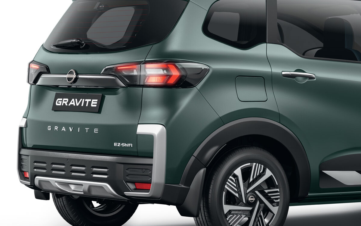 Rear three-quarter close-up of the Gravite's crystal-edge LED tail lamp and rear bumper