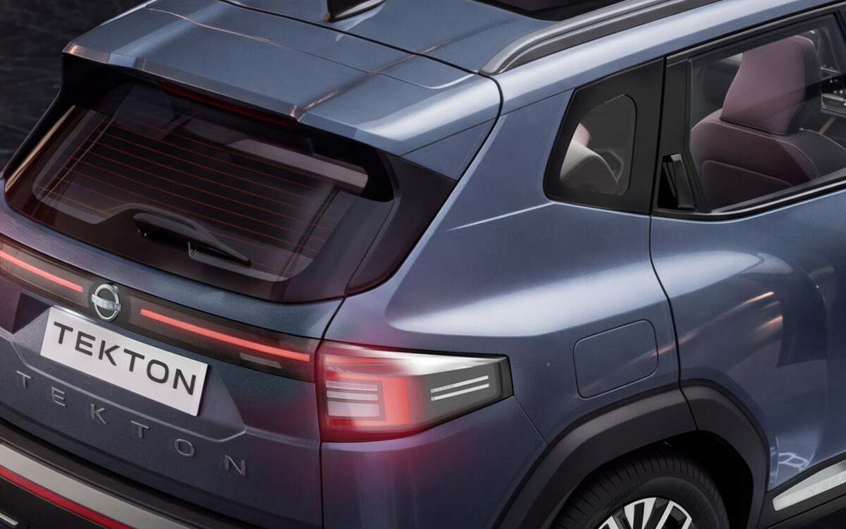 Rear three-quarter close-up of the Tekton showing the LED tail lamp, roof rails and rear glass