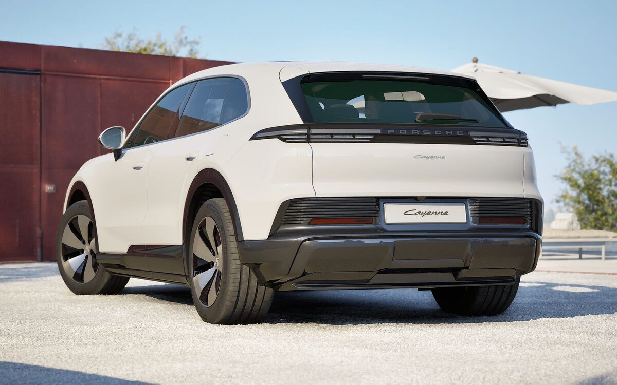 Porsche Cayenne Electric in white from the rear three-quarter with the tailgate open