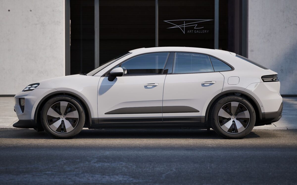 Porsche Macan Electric in white, side profile parked on a city street