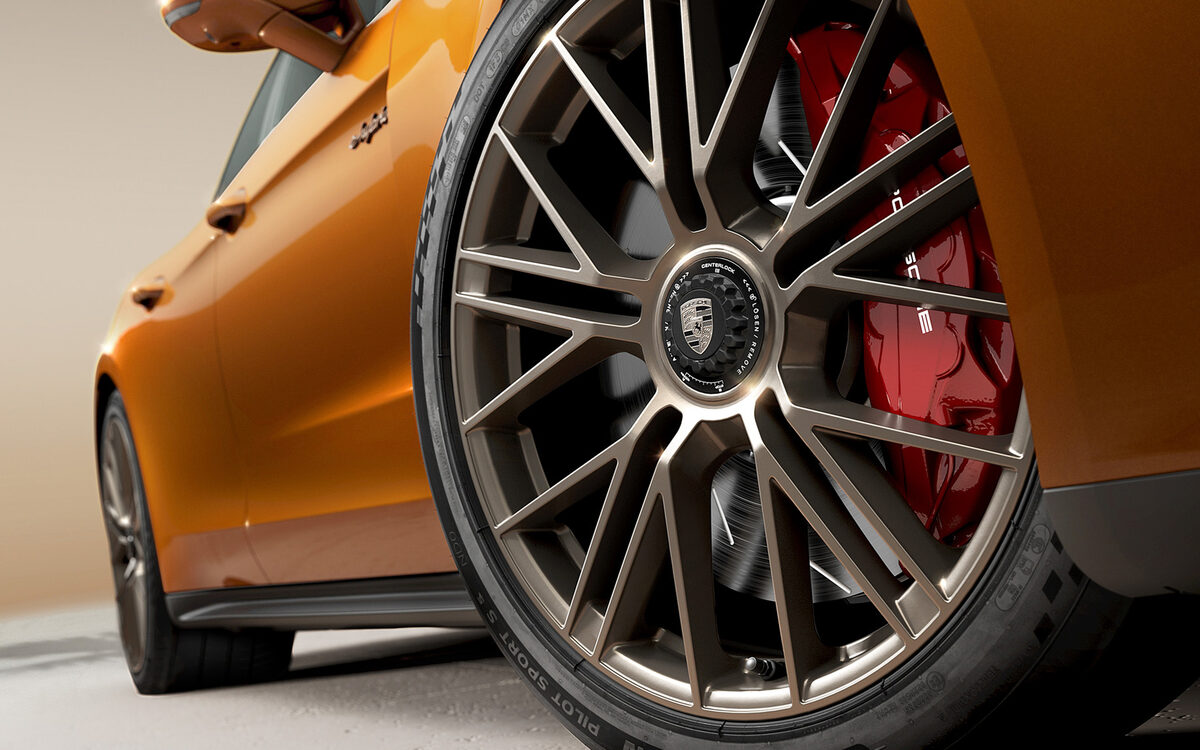 Close-up of a Porsche Panamera alloy wheel with a red brake caliper